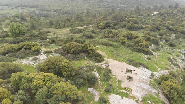 The ruins of the late Hellenic Jewish settlement Hurvat Sumak on Mount Carmel, Israel. View from the drone.