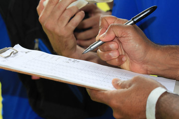 woman writing on notebook