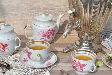 Tea Party in rustic style with russian samovar and knitted napkin