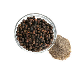 Ground black pepper and corns isolated on white, top view