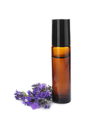 Bottle with natural lavender oil and flowers on white background