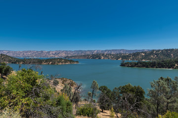 Fototapeta na wymiar Lake Berryessa seen from above off highway 128 in the Napa county mountains