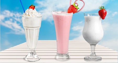 Glass of delicious strawberry cocktail isolated on white background