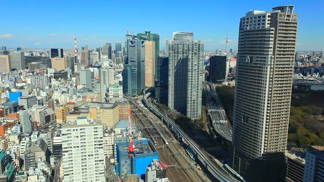 Panning shot of Tokyo panorama on sunny day