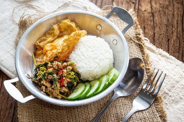 Original fried basil with pork served with jasmine rice and fried egg.