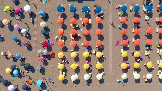 LIGNANO, ITALY - MAY, 2019: Lignano beach at Adriatic sea coastline in Italy aerial drone view. Europe during summer.