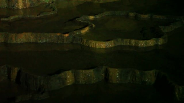 Tilt up of Hyakumai zara Hundred of plates in Akiyoshido cave, Japan