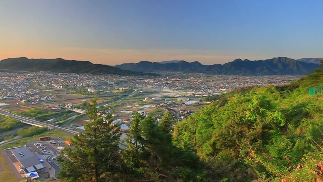 Panning shot of Chikuma River, Ueda City and Uedahara, Japan