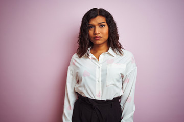 Transsexual transgender businesswoman standing over isolated pink background depressed and worry for distress, crying angry and afraid. Sad expression.
