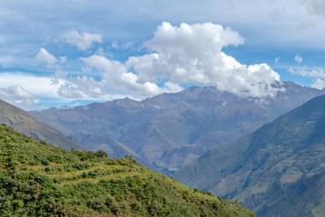 Fototapeta na wymiar Landscape with green deep valley, Apurimac River canyon, Peruvian Andes mountains on Choquequirao trek in Peru
