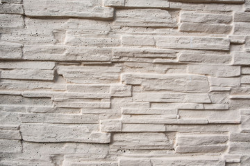 Decorative white painted thin bricks wall background