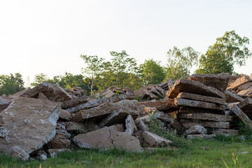 Fototapeta na wymiar View of concrete debris piles with sunlight.