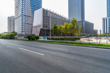 empty urban road with modern building in the city.