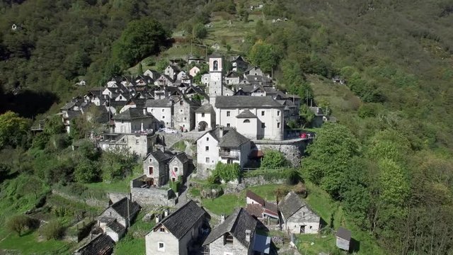 aerial view of medieval town village of Corippo in the mountains, small mountain village in Ticino Corippo, Verzasca valley, Switzerland