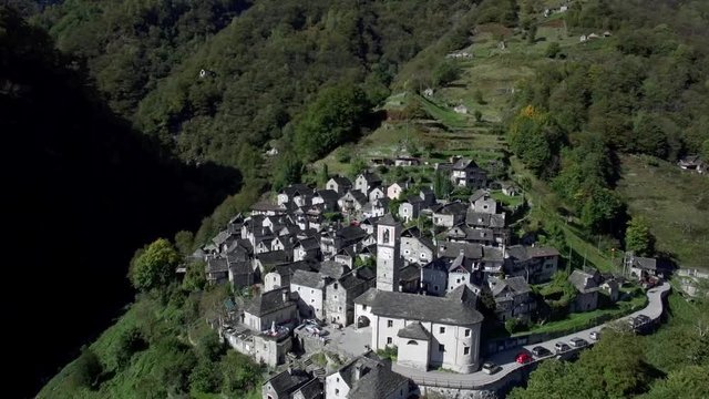 aerial view of medieval town village of Corippo in the mountains, small mountain village in Ticino Corippo, Verzasca valley, Switzerland