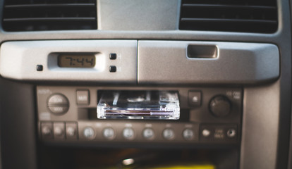 Close up tape cassette player in car