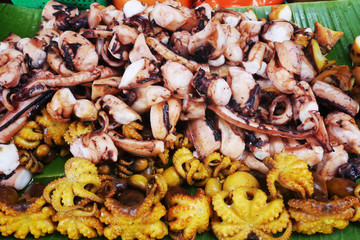 Grill octopus or squids street food in a local market