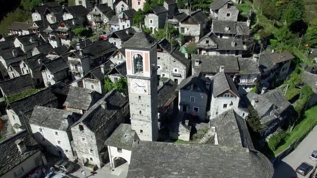 aerial view of church steeple in medieval town village of Corippo in the swiss mountains, small mountain village in Ticino, Switzerland