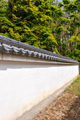 Fototapeta na wymiar White fence of Shingetsuin temple in Sanda, Hyogo, Japan