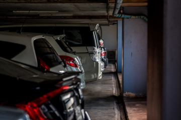 Blurred Walk way in car parking lot with background