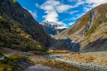 Fox glacier at new zealand. High mountains in valleys and glaciers in the morning with beautiful...