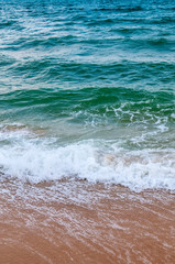 White waves on the beach