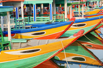 Fototapeta na wymiar Closeup view of colorful traditional Vietnamese tourist boats