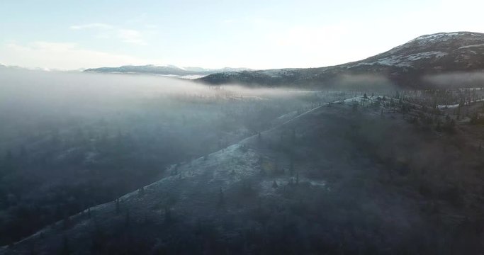 4K Raw Drone Footage [unedited or color coded]: Flying over freezing fog outside of Iliamna, Alaska during a late sunrise.