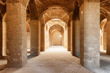 Fototapeta na wymiar Awesome vaulted arch passageway, the Jameh Mosque of Isfahan