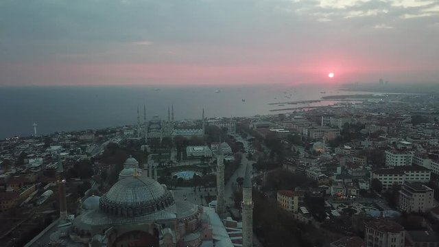 Aerial footage of Sunset in Istanbul. Hagia Sophia and Blue Mosque in Sultanahmet Square