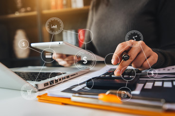 Digital marketing media in virtual screen.business working digital tablet, smartphone with keyboard and computer laptop at office in morning light