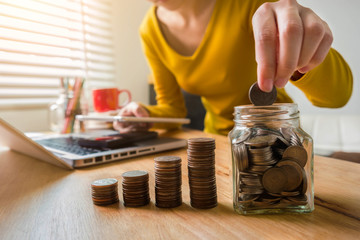 Business women are calculating daily expenses.