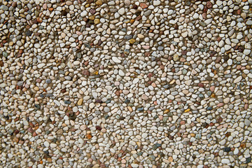 Stone asphalt texture of road. Grey asphalt road and gravel. Background pebble and gravel