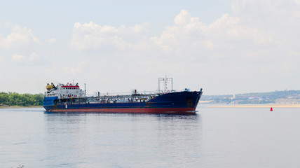 Fototapeta premium Blue tanker in the strait