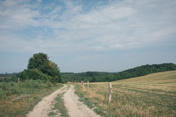 Fototapeta na wymiar Walk throught meadows and forests around Pohorany