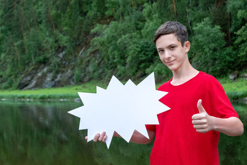 A teenager in a red T-shirt holding a white sign and raised his thumb up. Concept template...