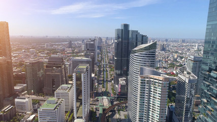 Fototapeta na wymiar Aerial city view of Bangkok downtown, Flying over Bangkok, Thailand.