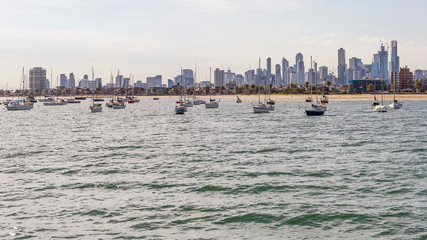 The city center and the skyline of Melbourne, Australia, seen from St Kilda Pier on a sunny day