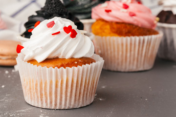 Delicious raspberry cupcakes on dark background - Handmade Sweet dessert