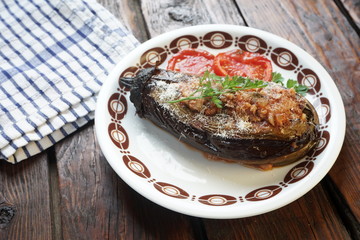 baked stuffed eggplant with tomatoes and Parmesan cheese