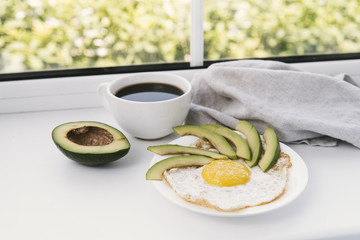 Tasty avocado and egg breakfast