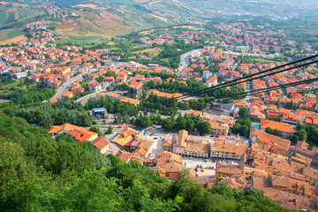 Fototapeta na wymiar View of San Marino from the height of the Funicular. cable car in San Marino