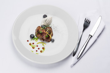 beef tenderloin with blueberries, ice cream and young peas