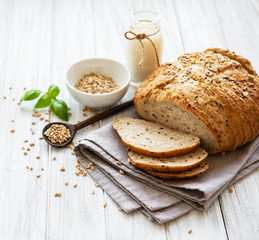 Naklejka premium Bread and glass of milk