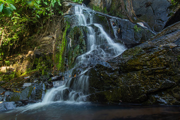 Fototapeta premium Ton Aow Yon Waterfall rich natural resources,in the forest,asia tropical areaat Island Phuket Thailand.