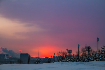 Ruby red sunset in a residential area of Moscow