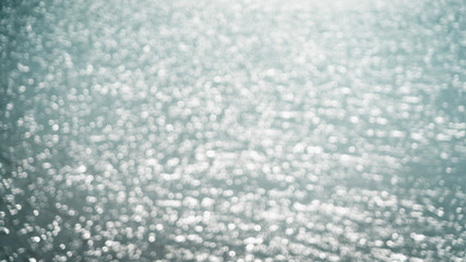 abstract blur or bokeh light on sea background in summer.