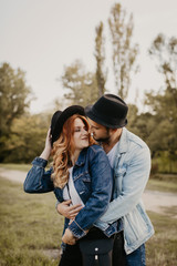 Happy loving couple outdoor in park .