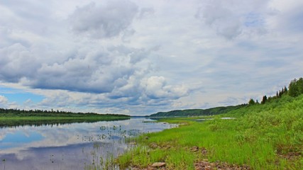 landscape with river and cloudy sky