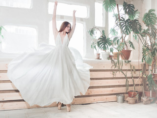 Portrait  of beautiful  balerina woman weared in white dress. Studio  shot,  natural  light © Olena Tkachenko